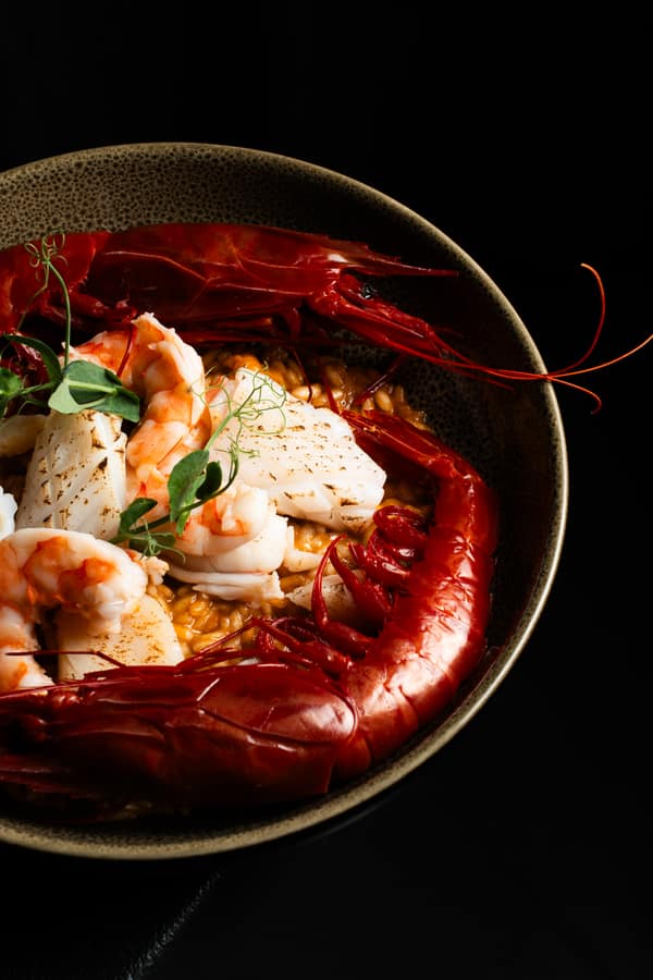 Rice with scarlet prawns and fish