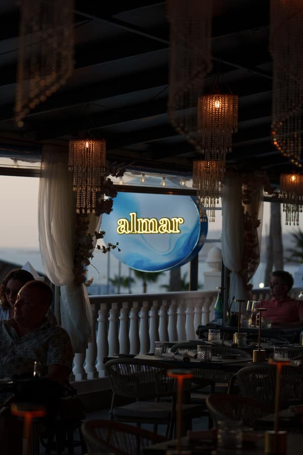 Restaurant interior with the Almar sign